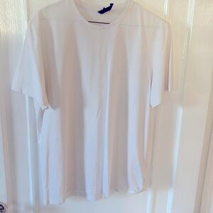 Classic high V-neck short sleeve tee with a solid true White color. Size M.